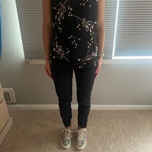 Slim ankle extra high rise pants stretchy waisted band, side and back pockets.